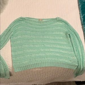 Beautifully knitted turquoise top